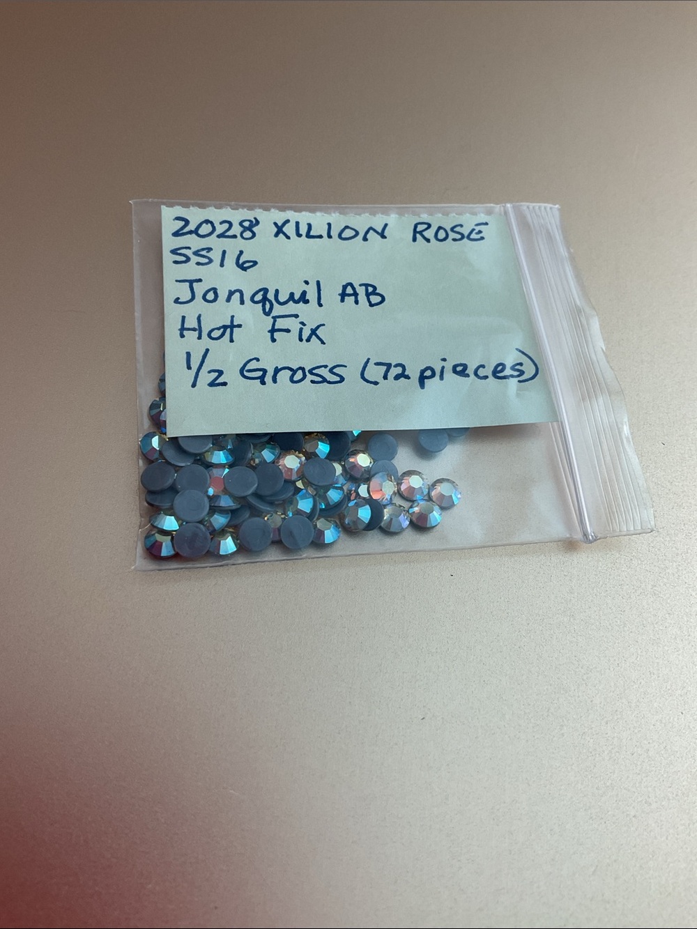 Swarovski • Color: Jonquil Aurora Borealis, 2028 XILION Rose Hotfix Rhinestones